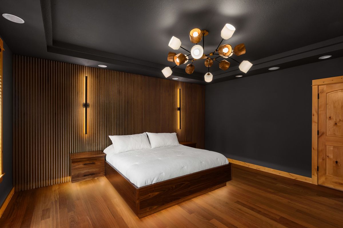 Primary bedroom, slat wall and bedside sconces