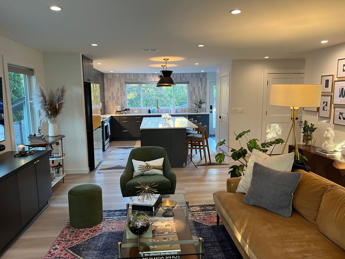 SW Portland whole-home remodel — living room opening to the kitchen