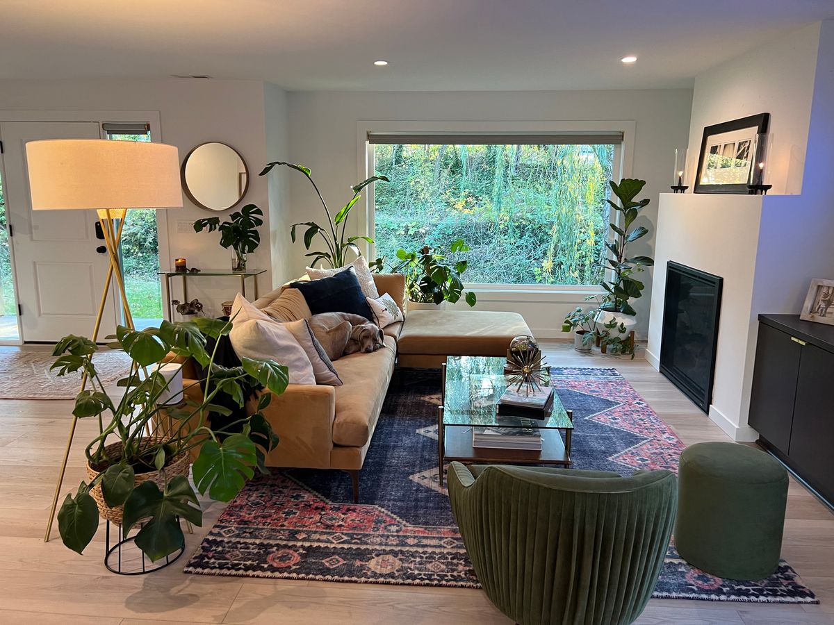 Living room with new windows, fireplace and refinished hardwood