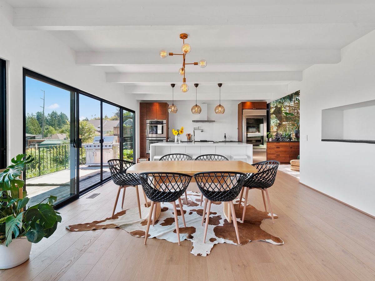SW Waterfront kitchen planned around exposed beams and a new sliding wall